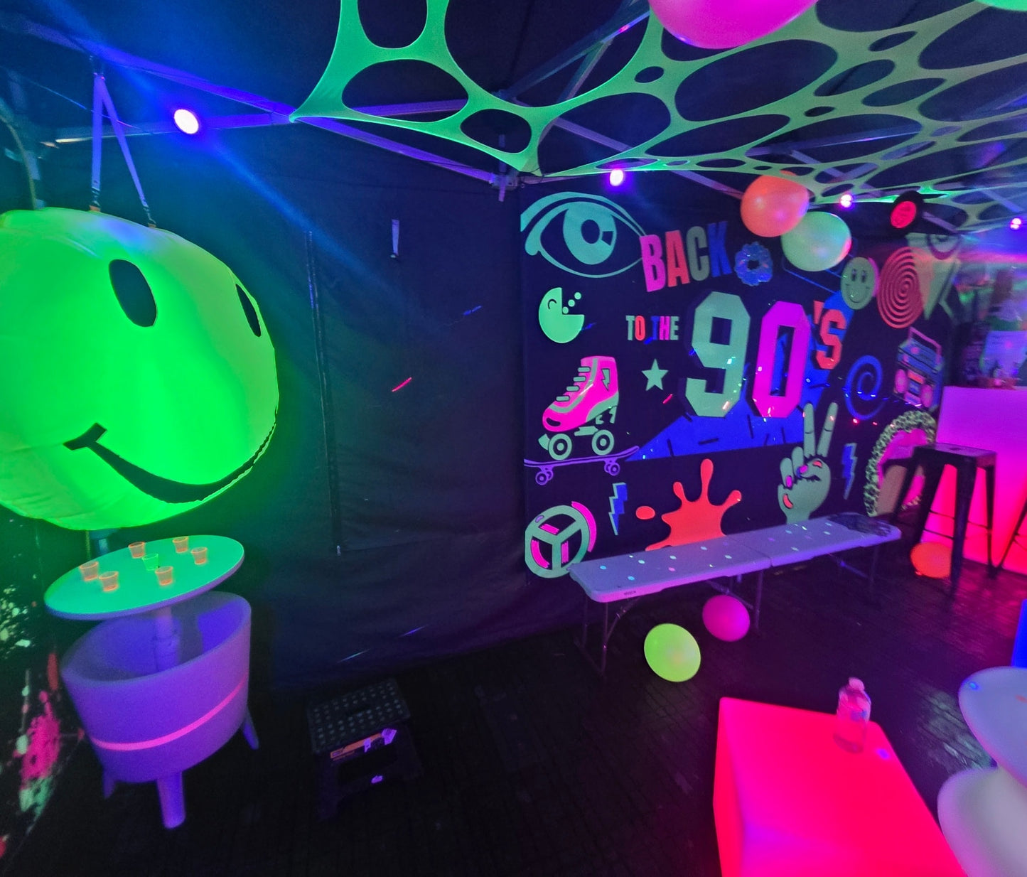 uv back to the 90s themed party tent hire