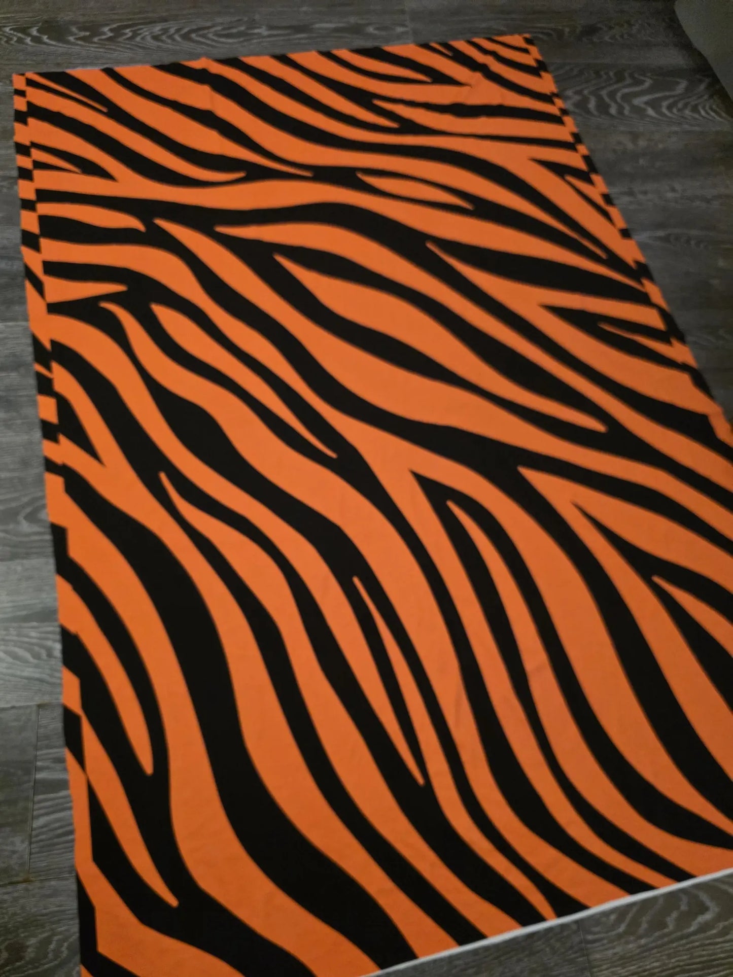 Orange zebra print fabric - not uv
