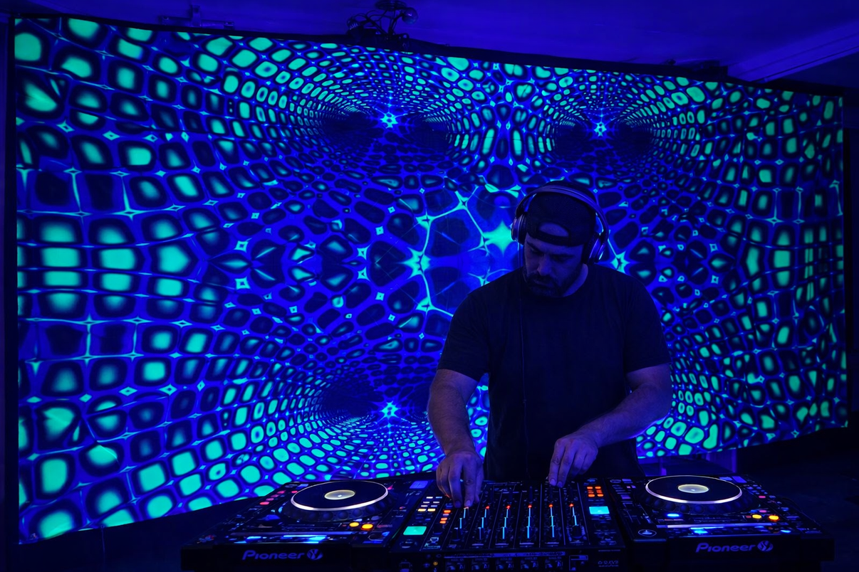 Uv Matrix Neon blacklight giant wall hanging tapestry by Lay-z-days Event's, featuring vibrant neon designs for UV decoration.