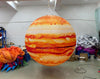 LED inflatable space-themed Jupiter decoration by Lay-z-days Event's™, designed for events, showing a large illuminated inflatable Jupiter planet.