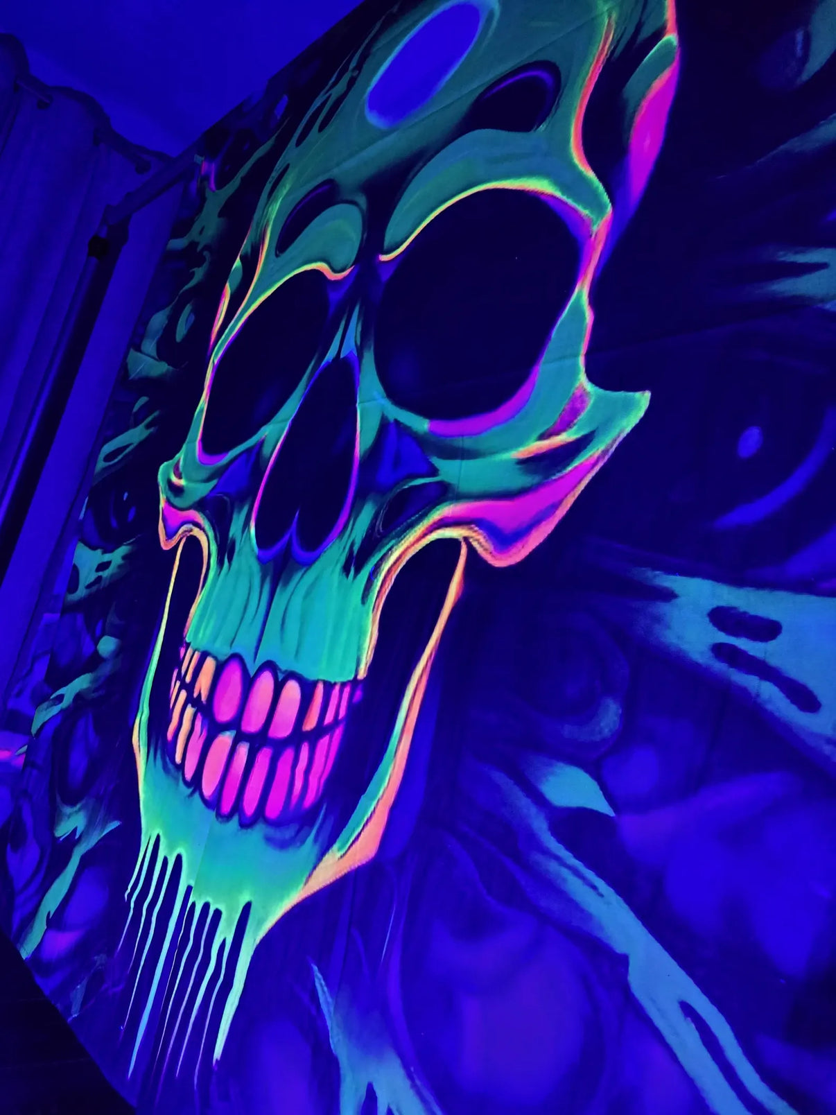 UV-reactive skeletal tapestry by Lay-z-days Event's, perfect for Halloween decorations, featuring a spooky skeletal design.