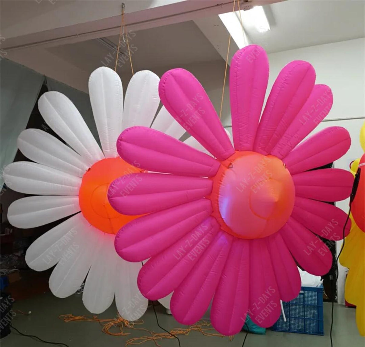 Large LED inflatable flower decoration by Lay-z-days Event's™, showing a vibrant, illuminated giant flower for event decor.