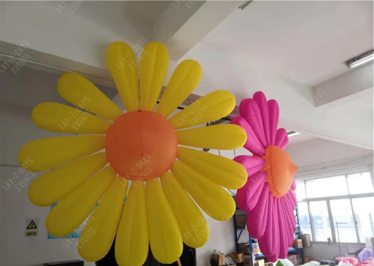 Large LED inflatable flower decoration by Lay-z-days Event's™, illuminated with bright lights for event decor and celebrations.