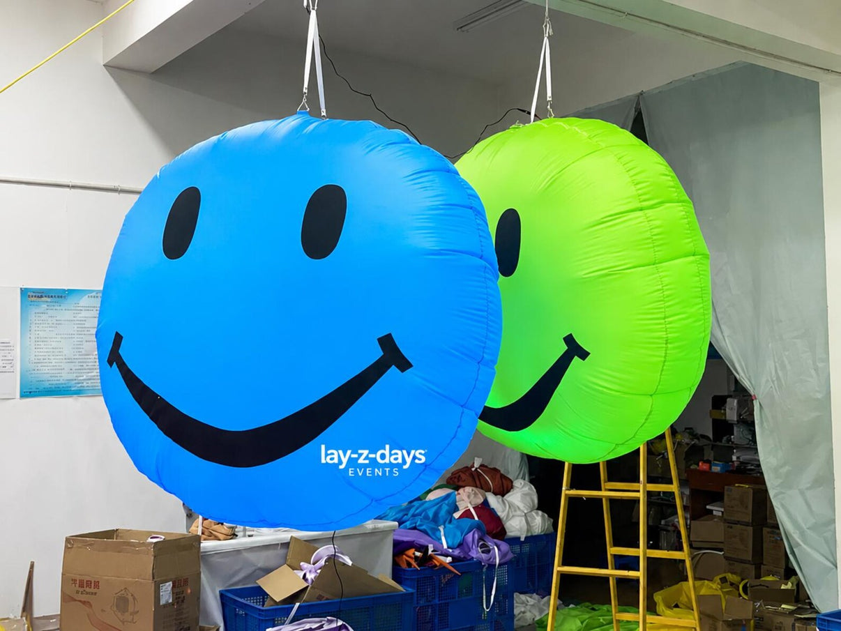 Inflatable LED Happy Rave event decoration by Lay-z-days Event's™, featuring bright LED lights and vibrant rave design.