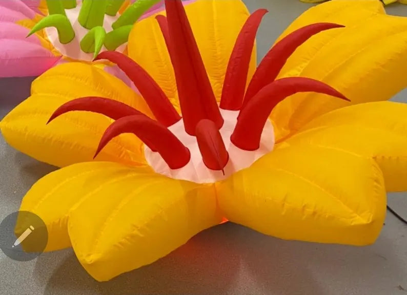 Large LED inflatable flower decoration by Lay-z-days Event's™, vibrant and illuminated for event decor and outdoor celebrations.