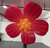 Red LED giant inflatable flower decoration by Lay-z-days Event's™, perfect for event decor and outdoor celebrations.