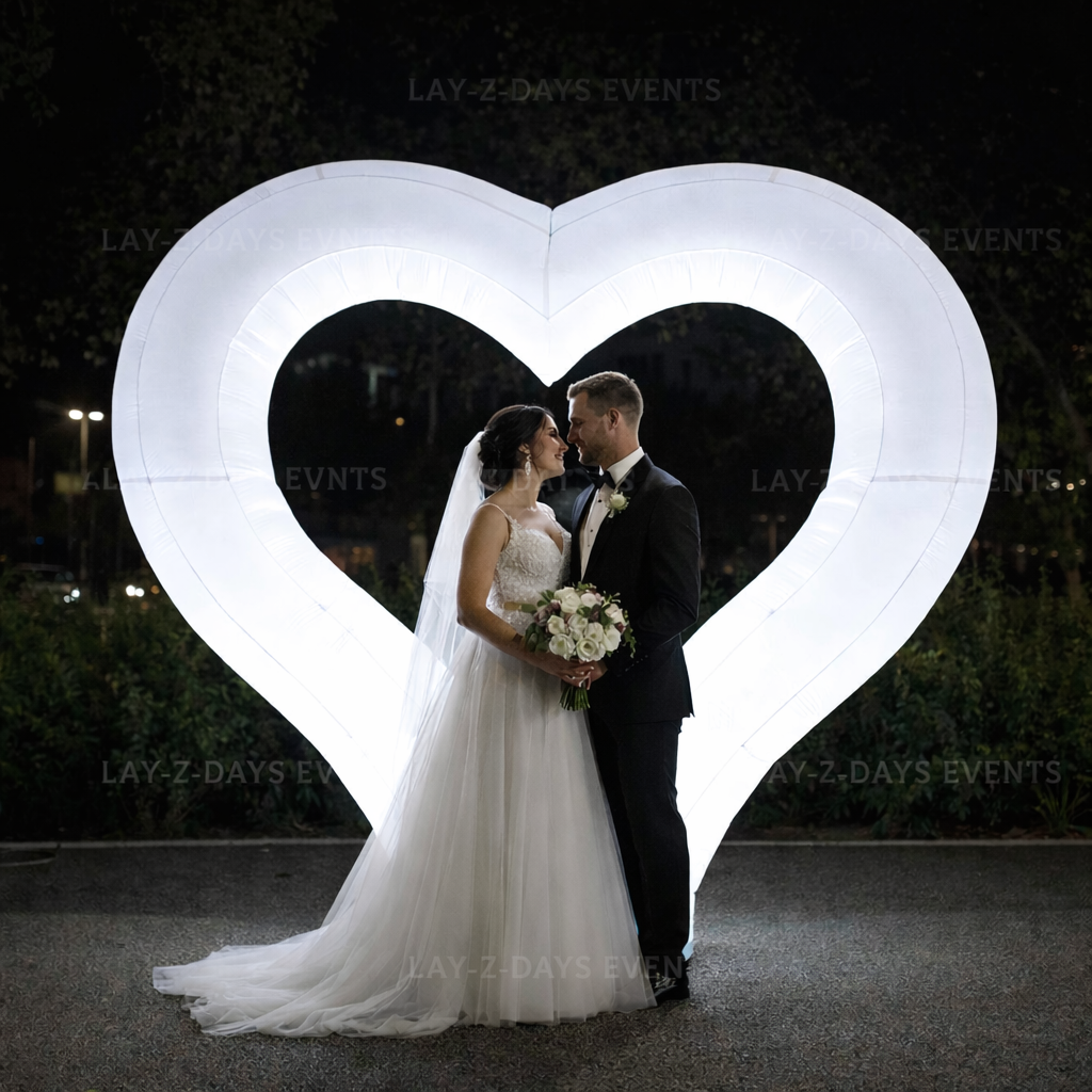 Lay-z-days Event's™ 2.7m giant LED inflatable love heart decoration, perfect for weddings, anniversaries, and Valentine's events.