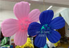 Pink and blue LED inflatable flower decoration by Lay-z-days Event's™, illuminated and inflated for event decor.