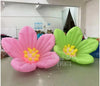 Pink and green LED inflatable flower decoration by Lay-z-days Event's™, perfect for outdoor events and celebrations.