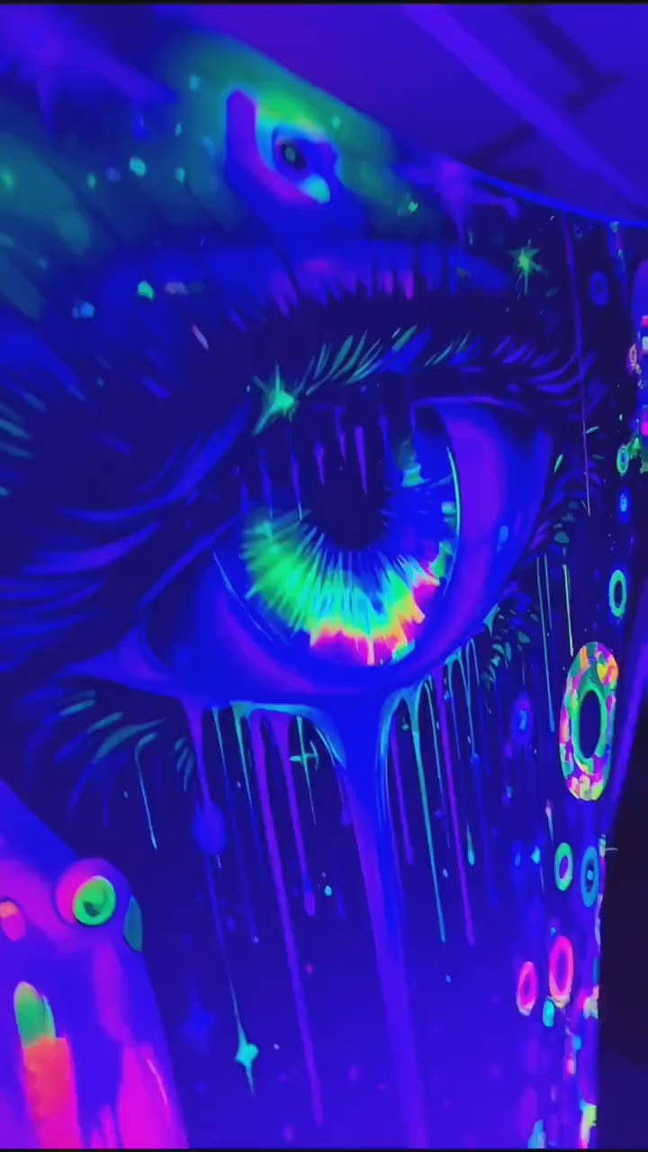 stretchy trippy eye decor triangular neon uv reactive glowing webbing stretch event décor for festivals, psytrance, sensory rooms, raves, DJs & more!