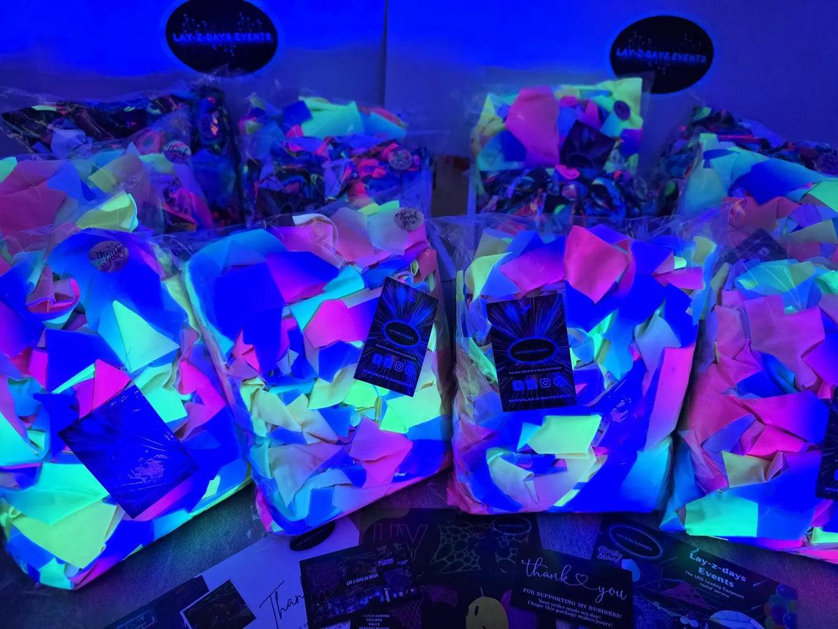 UV Rainbow Stretch Webbing from Lay-z-days Event's™, neon rave and festival decor with reactive UV-reactive stretch camo netting.