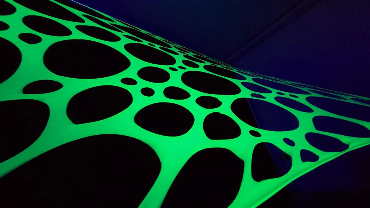 UV neon green stretch webbing for rave and party decor by Lay-z-days Event's™, ideal for blacklight ceiling and lighting setups.