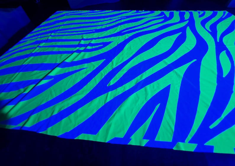 UV blacklight zebra print fabric by Lay-z-days Event's™, 1.5 meters of vibrant green neon zebra pattern material.